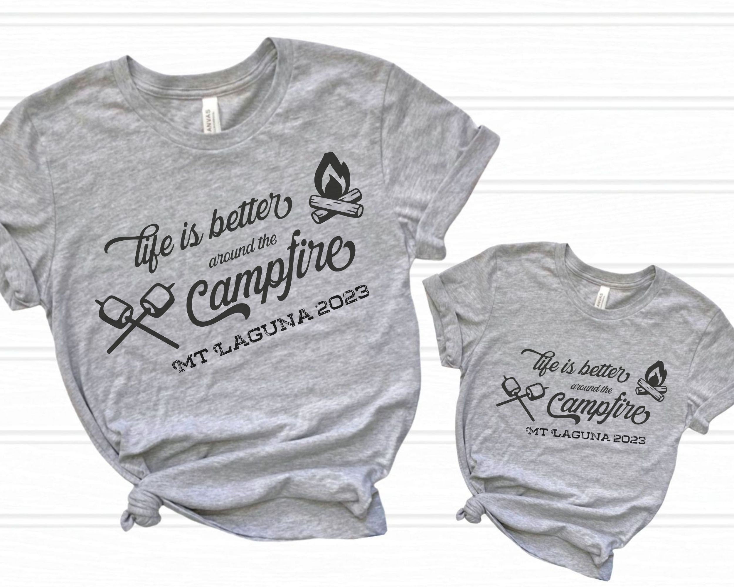 Adult and kid sized Custom matching family camping shirts with life is better around the campfire design on gray shirts