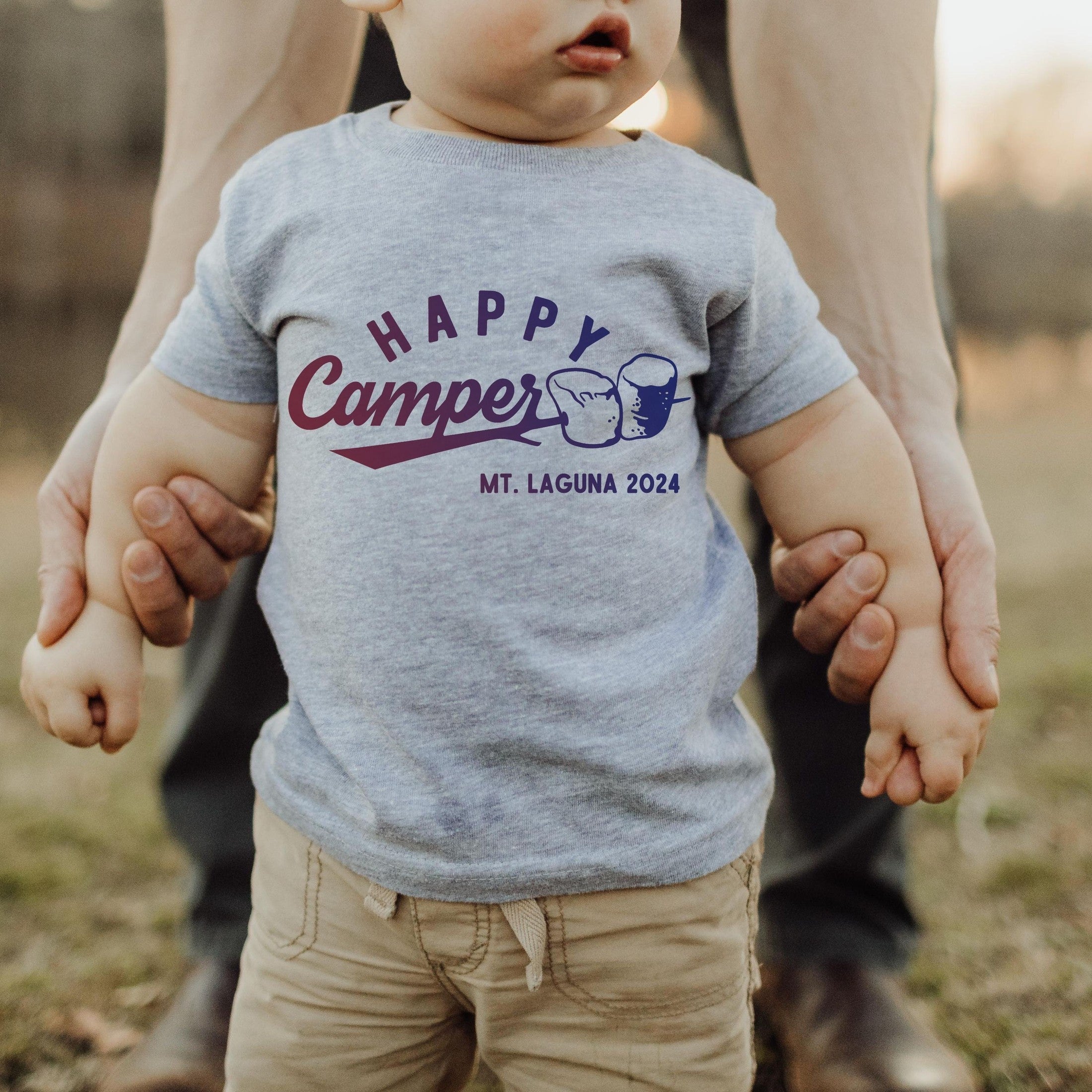 Infant wearing custom matching family adventure vacation shirt with s&