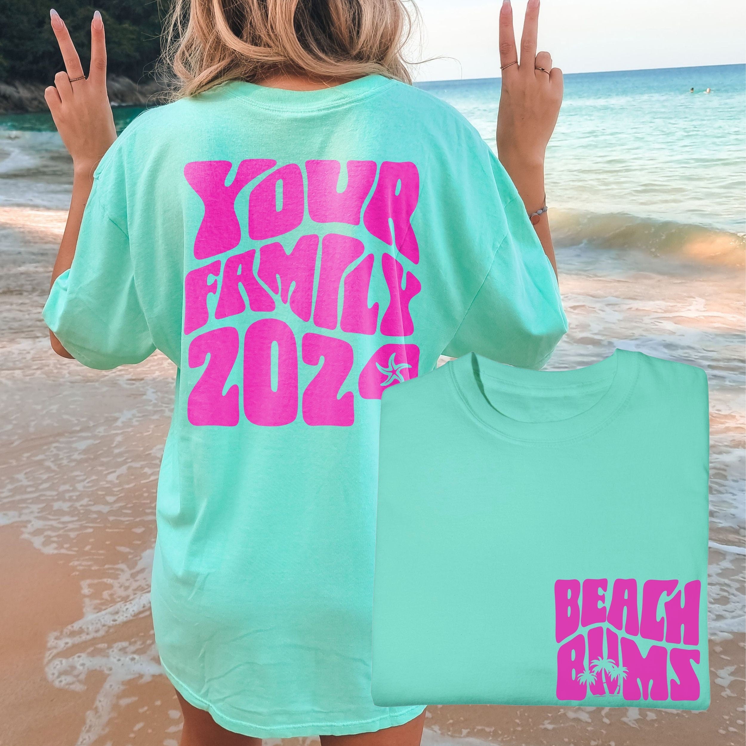 Woman wearing matching family vacation shirt with retro beach bums design in comfort colors island reef