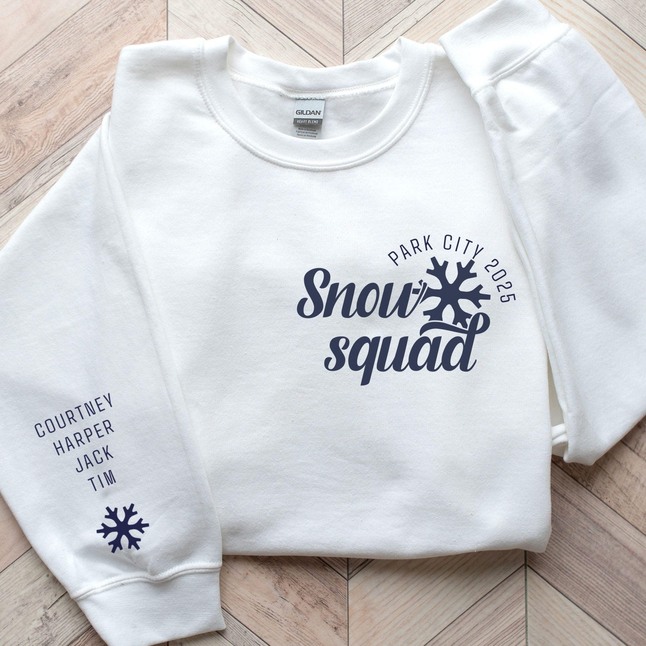 Custom matching family snow Squad sweatshirt for group ski weekend mountain vacation with sleeve print for names shown in white