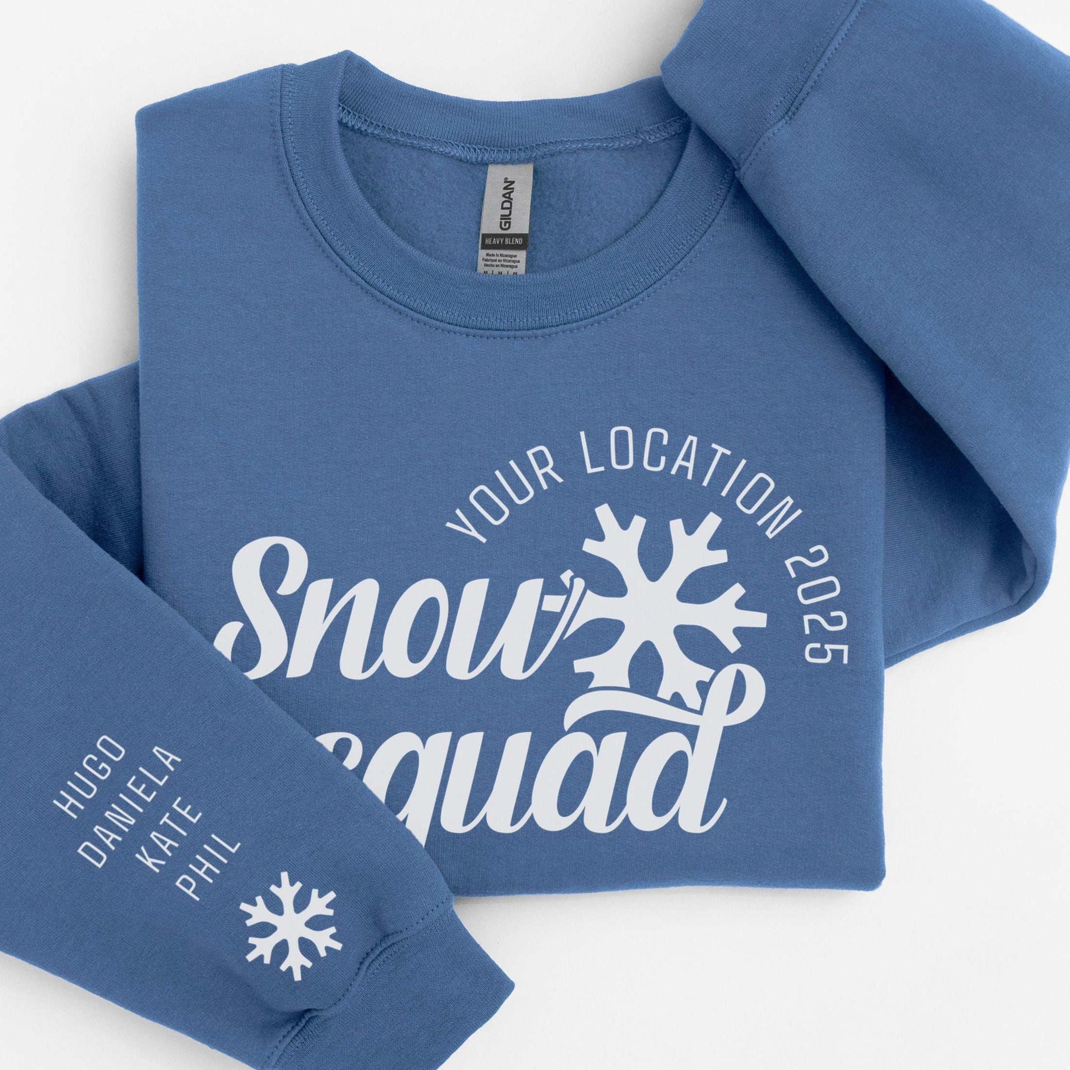 Custom matching family snow Squad sweatshirt for group ski weekend mountain vacation with sleeve print for names shown in indigo blue