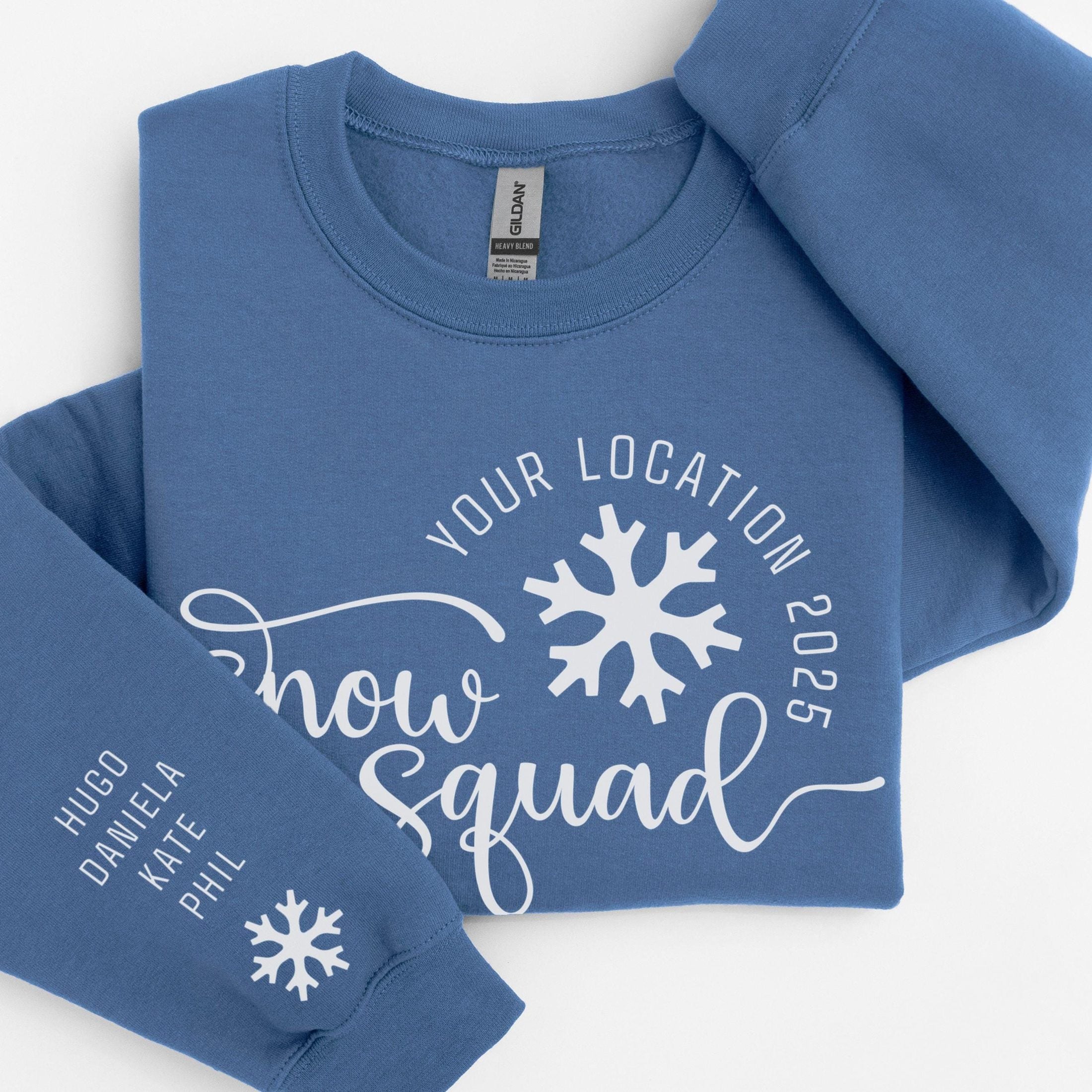 Custom matching family snow Squad sweatshirt for group ski weekend mountain vacation with sleeve print for names shown in indigo blue
