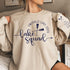 Custom matching family Lake Squad sweatshirt for group lake life vacation with sleeve print for names shown in sand
