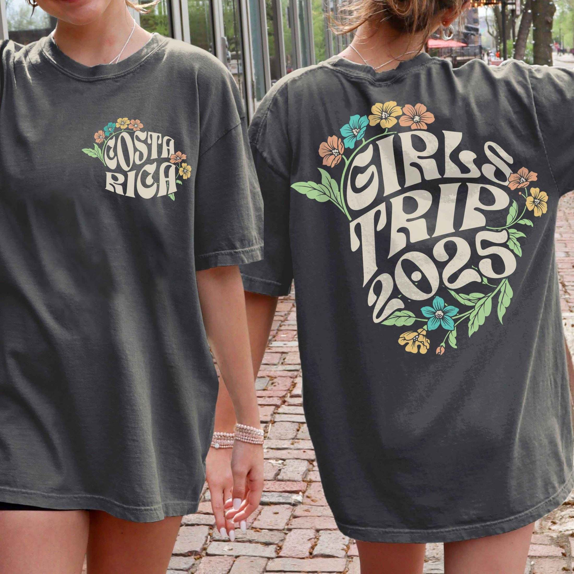 Woman wearing custom matching 60s or 70s retro floral girls trip shirts for group vacation shown in Comfort Colors pepper