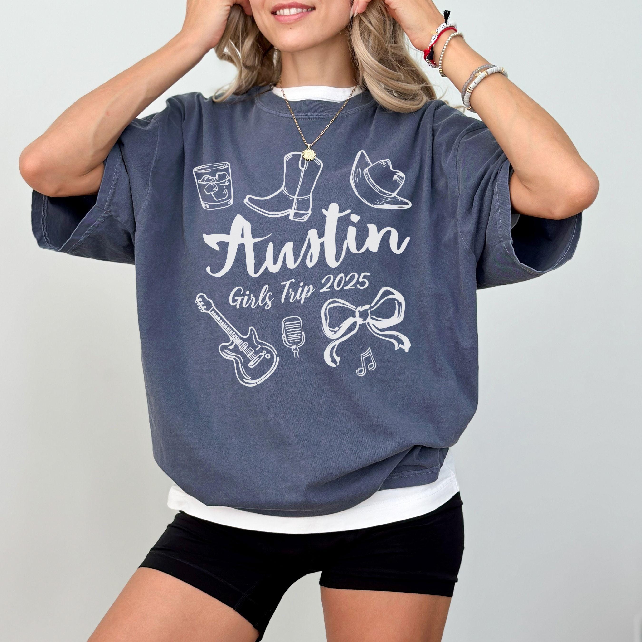 Austin girls trip shirt with coquette bow and travel doodle design, printed on Comfort Colors Denim for matching group vacations