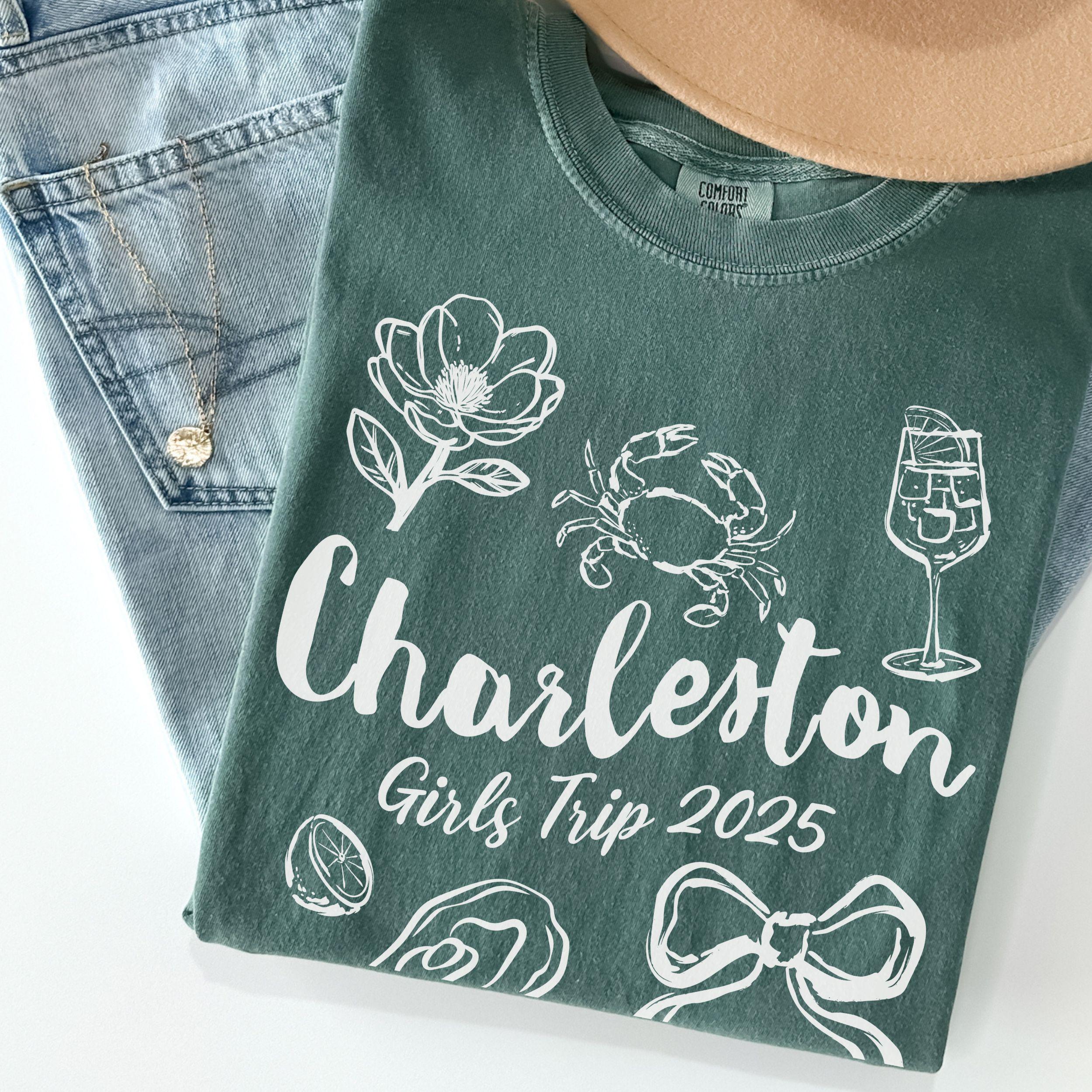 Charleston girls trip shirt with coquette bow and travel doodle design, printed on Comfort Colors Blue Spruce for matching group vacations