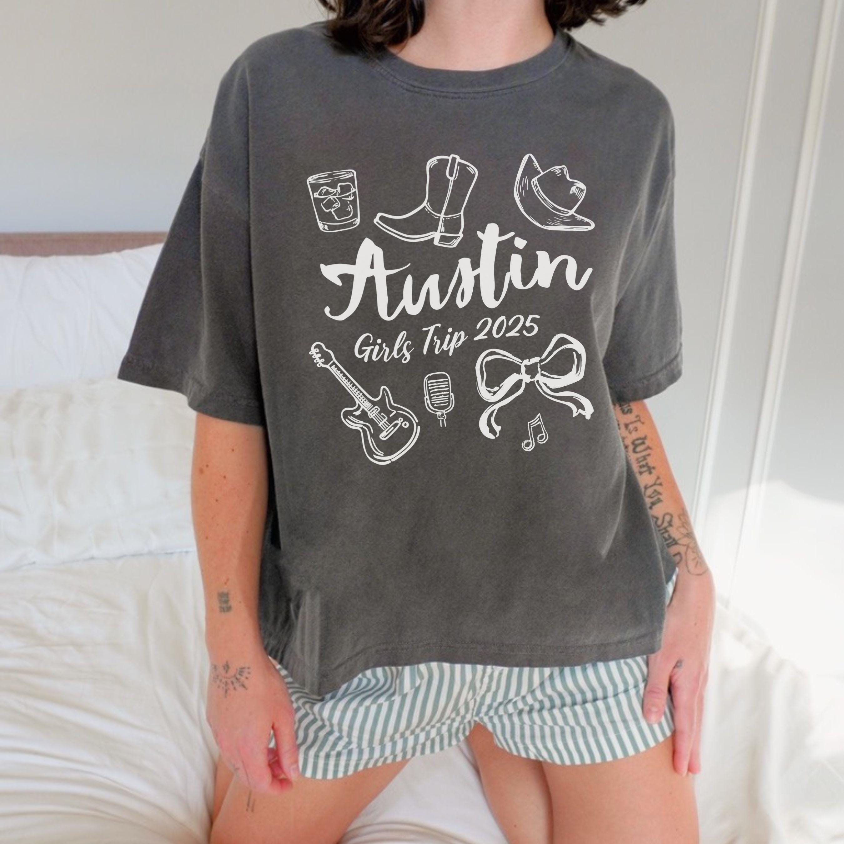 Austin girls trip shirt with coquette bow and travel doodle design, printed on Comfort Colors Pepper Boxy tee crop for matching group vacations