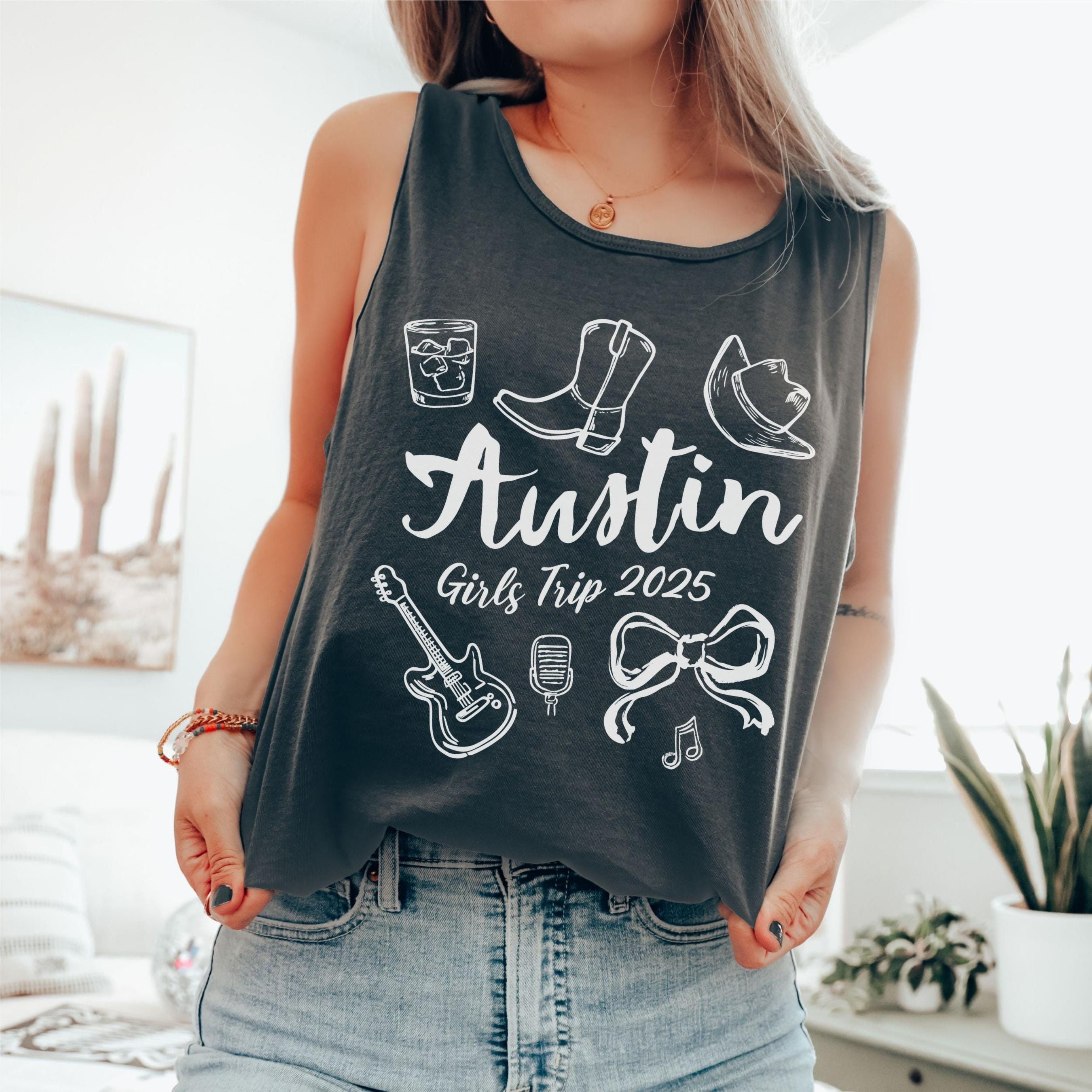 Austin girls trip shirt with coquette bow and travel doodle design, printed on Comfort Colors Pepper tank for matching group vacations