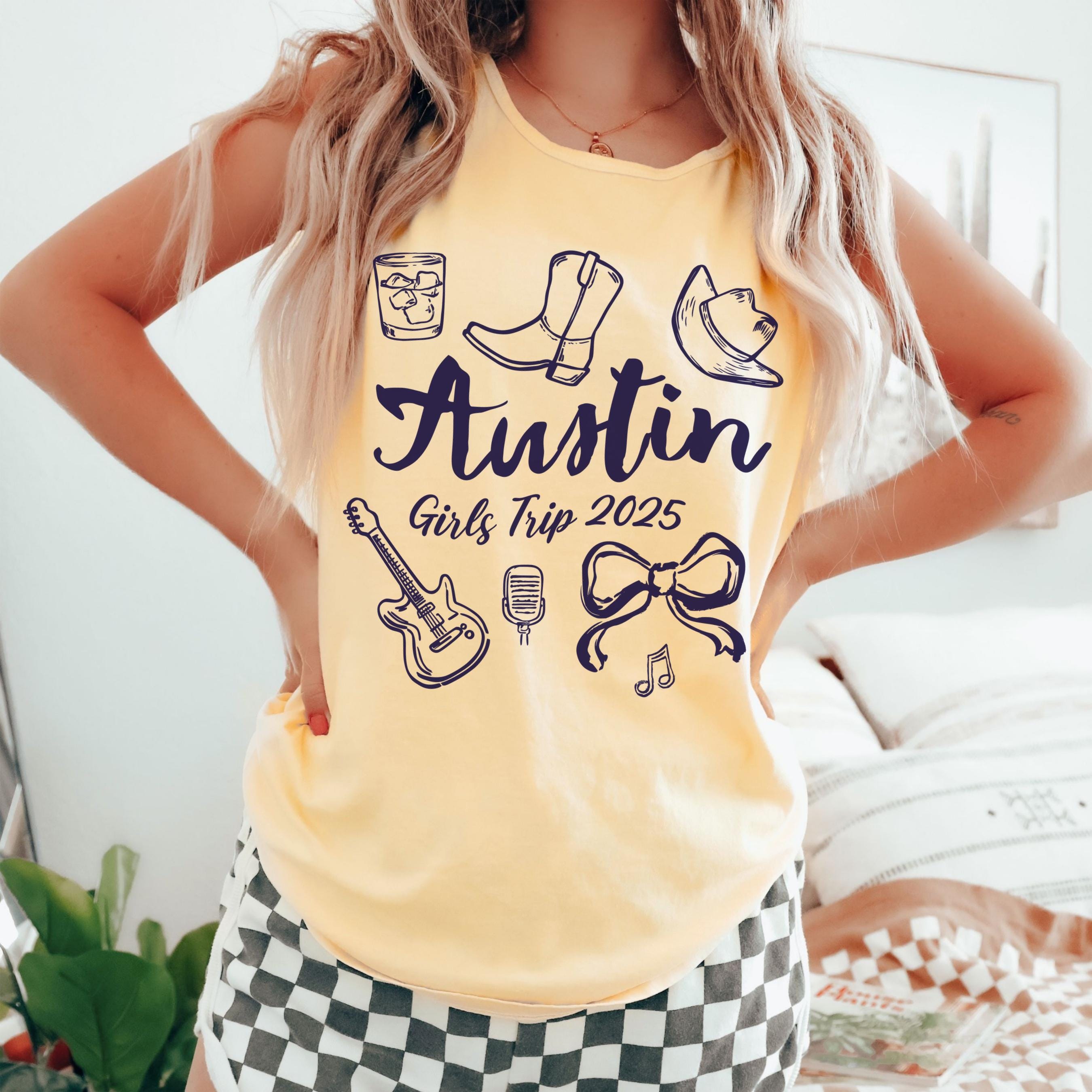 Austin girls trip shirt with coquette bow and travel doodle design, printed on Comfort Colors butter tank top for matching group vacations