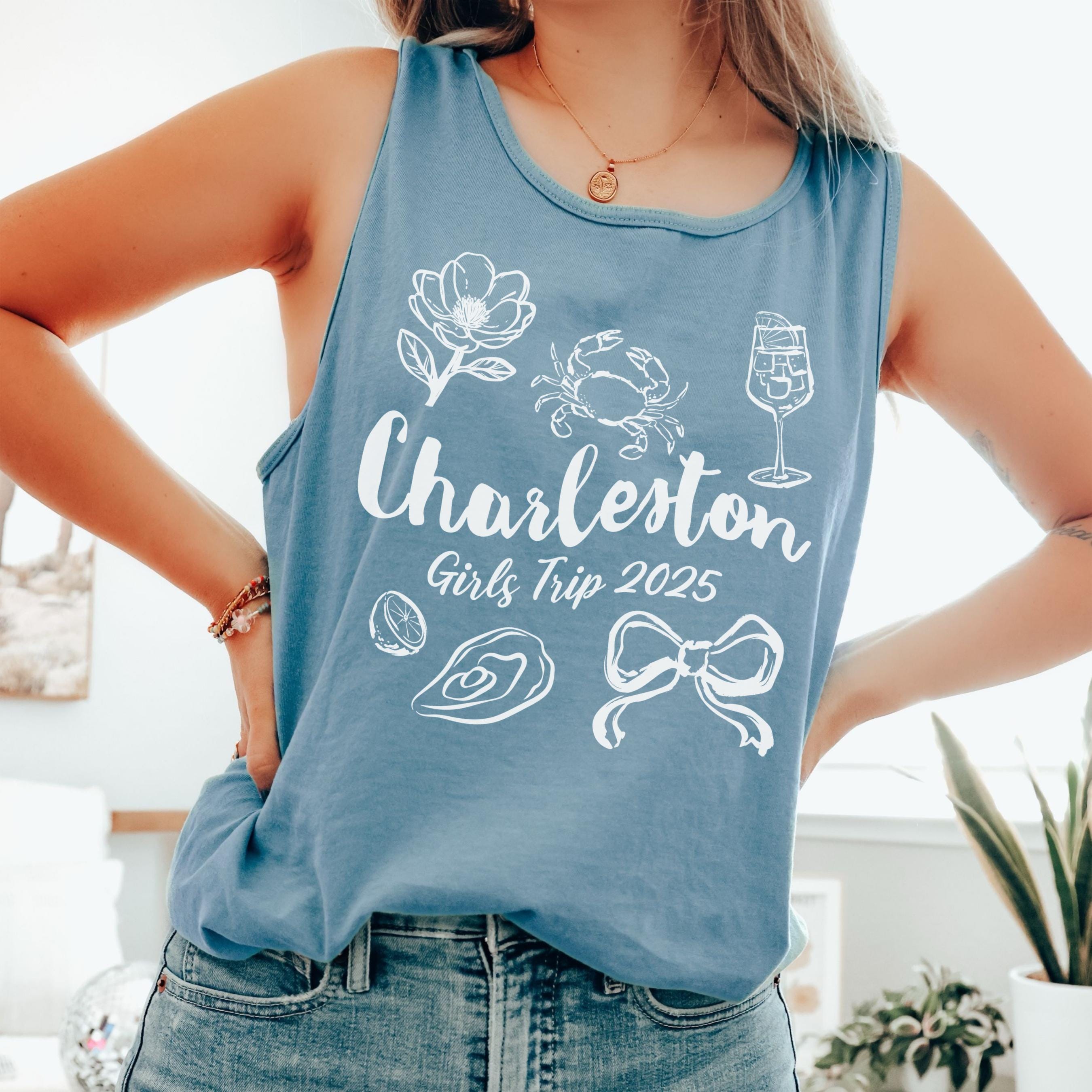 Charleston girls trip shirt with coquette bow and travel doodle design, printed on Comfort Colors Ice Blue tank for matching group vacations