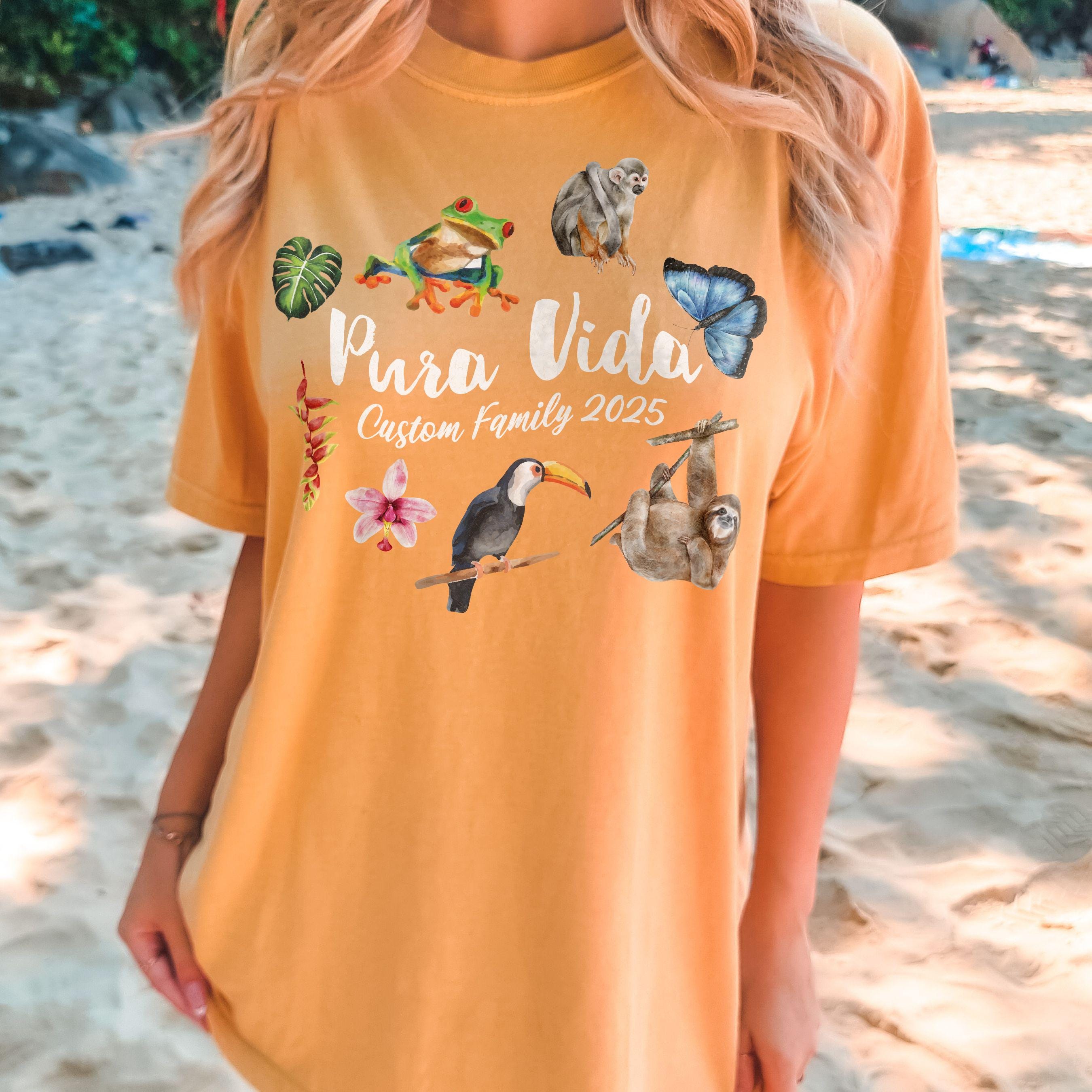 Costa Rica Pura Vida sloth and toucan design on Comfort Colors Citrus matching family vacation shirt.