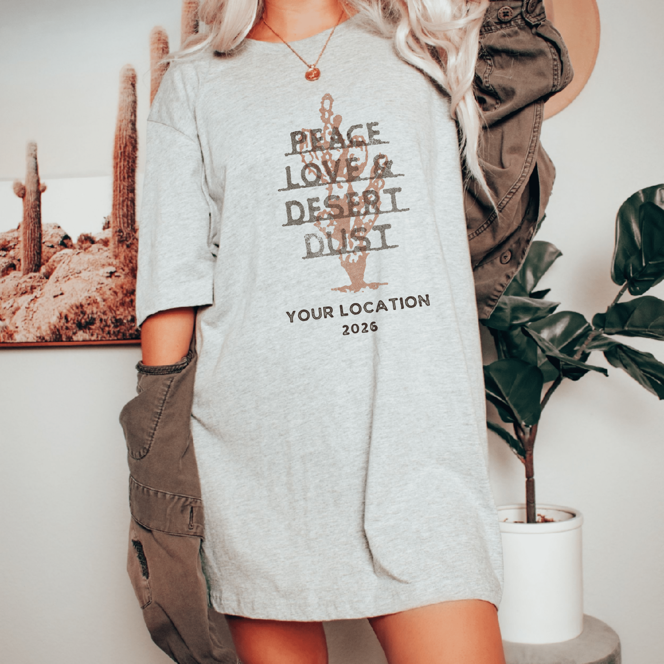 Woman wearing Custom matching group Southwestern boho style girls trip shirt with desert dust design on ash tshirt