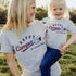 Woman and toddler wearing custom matching family adventure vacation shirt with s&