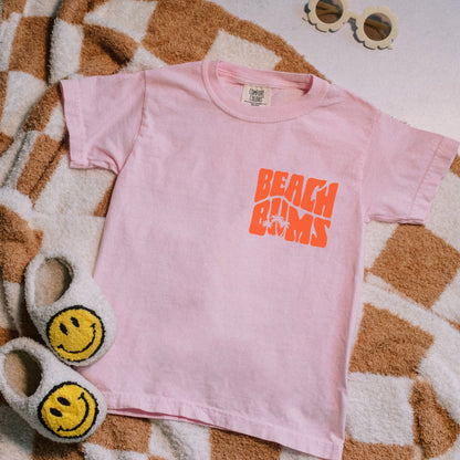 Kids size matching family vacation shirt with retro beach bums design in comfort colors blossom