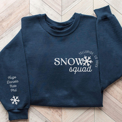 Custom matching family snow Squad sweatshirt for group ski weekend mountain vacation with sleeve print for names shown in navy