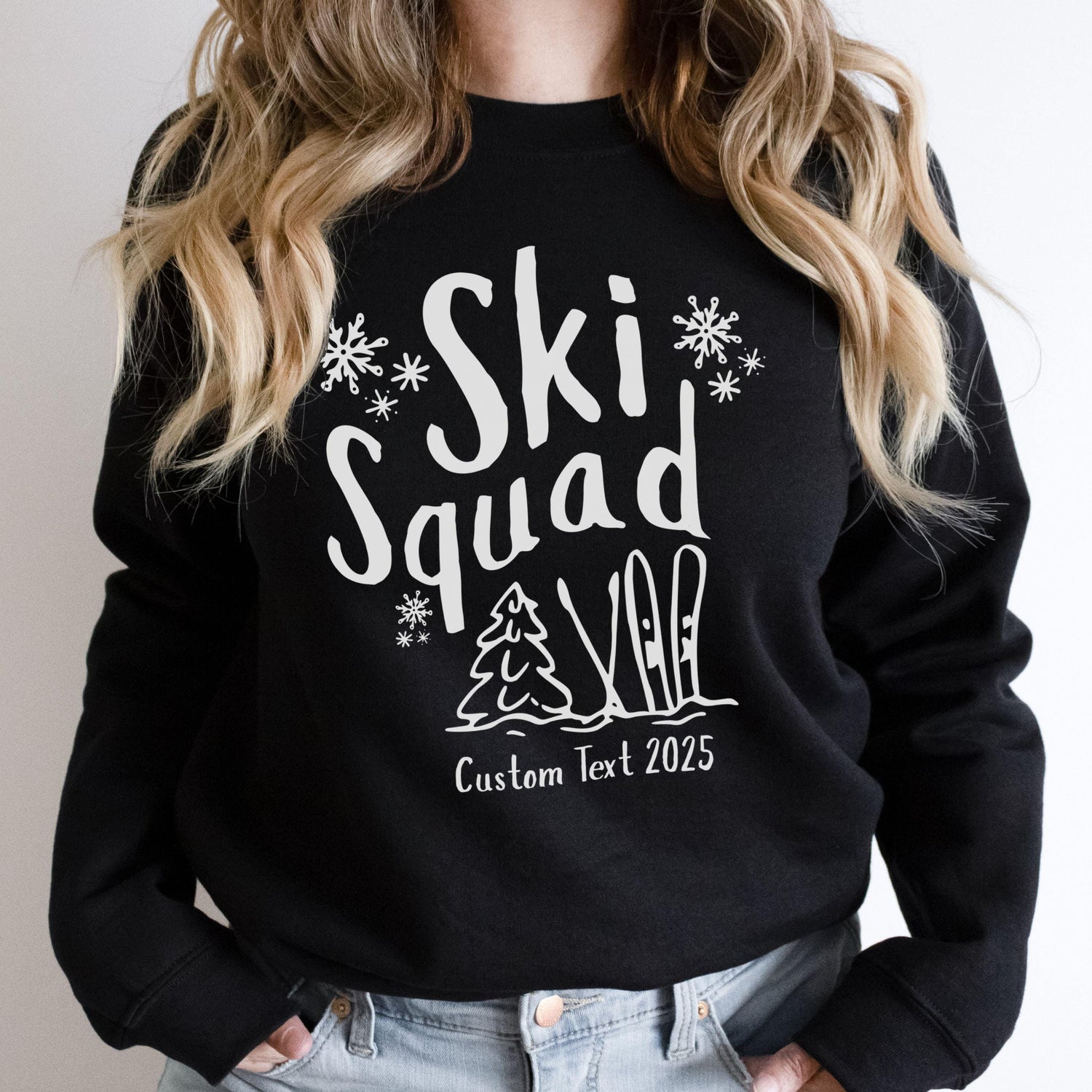 Custom Ski Squad sweatshirt with winter snow doodle design, perfect for matching family or group ski trip. Shown in Black