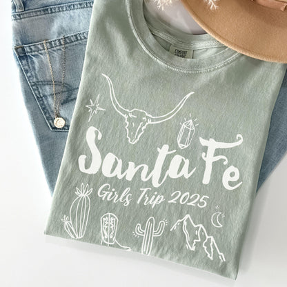 Matching Santa Fe desert girls weekend trip shirt with Western doodle design, featuring cactus and skull on Comfort Colors Bay